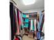 Spacious walk-in closet with custom shelving and ample storage space for clothes, shoes, and accessories at 635 Portside Dr, Davidson, NC 28036