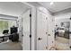 Hallway with entry to office and bedroom at 635 Portside Dr, Davidson, NC 28036