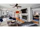 Spacious living room with fireplace, open layout, and modern finishes at 635 Portside Dr, Davidson, NC 28036