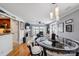 Bright living room with fireplace, hardwood floors and lake view at 635 Portside Dr, Davidson, NC 28036