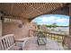 Charming covered patio with comfortable seating, perfect for enjoying the views of the lake and sunset at 635 Portside Dr, Davidson, NC 28036