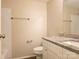 Bright bathroom featuring granite counters, a white vanity, and tile flooring at 7021 Willow Bend Ln, Mint Hill, NC 28227