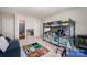 Inviting bedroom showcasing a playful bunk bed, colorful decor, and ample space for creative play at 711 Saddlebred Ln, Locust, NC 28097