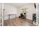 Office space with hardwood floors, natural light, a workspace and a neutral color scheme at 711 Saddlebred Ln, Locust, NC 28097