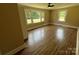 Bedroom featuring wood-look flooring and windows at 8095 New St, Mount Pleasant, NC 28124