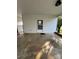 Covered patio featuring a door, textured flooring, and a clean, functional outdoor space at 8095 New St, Mount Pleasant, NC 28124