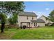 Large backyard with a patio, perfect for outdoor entertaining and relaxation at 8808 Palmutum Pl, Charlotte, NC 28269