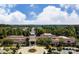Beautiful clubhouse with a clock tower, meticulously manicured grounds and ample parking at 9020 Smokey Hill Ln, Fort Mill, SC 29707
