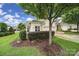 Charming single-story home featuring a manicured lawn and a welcoming front entrance at 9020 Smokey Hill Ln, Fort Mill, SC 29707