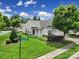 Attractive home on a corner lot with lush green lawn, mature tree, and well-maintained landscaping at 9020 Smokey Hill Ln, Fort Mill, SC 29707