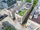 Aerial view of modern townhomes featuring rooftop patio spaces at 925 Westbrook Dr # B, Charlotte, NC 28202