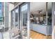 Balcony view with seating that looks into living room with stairs at 925 Westbrook Dr # B, Charlotte, NC 28202