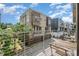 Balcony view of a modern three-story home in neutral tones at 925 Westbrook Dr # B, Charlotte, NC 28202