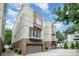 Modern exterior with brick, private balconies, and garages at 925 Westbrook Dr # B, Charlotte, NC 28202