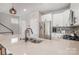 A spacious kitchen boasts granite countertops, stainless appliances, and mosaic backsplash detailing at 925 Westbrook Dr # B, Charlotte, NC 28202