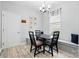 Cozy dining area featuring natural light, stylish decor, and seating for four at 9733 Paper Tree Rd, Charlotte, NC 28227