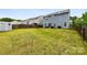 A sprawling back yard with a shed and seating area at 1022 Hinson Forest Rd, Monroe, NC 28110