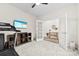 Bedroom featuring plush carpeting, TV, storage, and plenty of natural light at 1022 Hinson Forest Rd, Monroe, NC 28110