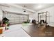 Organized garage with work-out equipment and extra storage space at 1022 Hinson Forest Rd, Monroe, NC 28110
