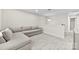 Neutral-toned loft area with cozy seating and carpeted flooring at 1022 Hinson Forest Rd, Monroe, NC 28110