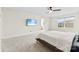 Bright main bedroom features a ceiling fan, large window, and TV on the wall at 1022 Hinson Forest Rd, Monroe, NC 28110