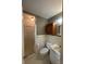 Bathroom with shower, toilet, vanity, and patterned wallpaper for a classic style at 1115 Dumbarton Rd, Gastonia, NC 28054