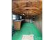 Interior shot of a storage shed with a workbench and lots of shelves at 1115 Dumbarton Rd, Gastonia, NC 28054