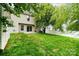 Spacious backyard with lush greenery and white fence at 116 Amber Woods Dr, Tega Cay, SC 29708