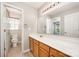 Bathroom includes a long vanity with a mirror, and a toilet room at 116 Amber Woods Dr, Tega Cay, SC 29708