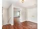 Inviting foyer with hardwood floors and closet, transitions seamlessly into the living spaces at 116 Amber Woods Dr, Tega Cay, SC 29708