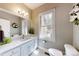 Comfortable full bathroom, big mirror, clean bright colors with a great window view at 118 Tayport Dr, Troutman, NC 28166