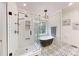 Stunning bathroom with patterned floors, soaking tub, separate shower, and subway tile surround at 118 Tayport Dr, Troutman, NC 28166