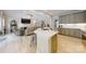 Kitchen island, open floor plan, light countertops, stainless appliances at 118 Tayport Dr, Troutman, NC 28166