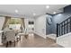 Dining area with sliding doors to the outside and view of stairs at 124 Kristin View Ln # C, Troutman, NC 28166