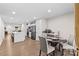 Open floor plan shows kitchen with island, dining area with table, and living room at 124 Kristin View Ln # C, Troutman, NC 28166