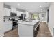 Modern kitchen with stainless steel appliances, a large center island, and ample counter space at 124 Kristin View Ln # C, Troutman, NC 28166