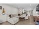 Inviting living room showcasing a comfortable sectional sofa, hardwood floors, and seamless open-concept design at 124 Kristin View Ln # C, Troutman, NC 28166