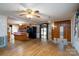 Open concept kitchen and living room featuring hardwood floors and kitchen island at 13101 Pine Bluff Rd, Midland, NC 28107