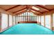 Sun-filled room featuring floor to ceiling windows and a unique ceiling design at 13101 Pine Bluff Rd, Midland, NC 28107