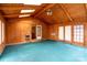 This sunroom has a vaulted ceiling with skylights, wood paneled walls, and an AC unit at 13101 Pine Bluff Rd, Midland, NC 28107