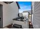 Relax in this home's private outdoor hot tub with seating on a sunny day at 14105 Ryker Way, Davidson, NC 28036