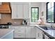 Bright kitchen featuring stainless steel appliances and ample counter space at 14105 Ryker Way, Davidson, NC 28036