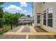 Wide angle shot of a spacious back deck featuring black metal railings and direct access to the home at 14616 Pomerol Ln, Pineville, NC 28134