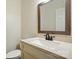 Powder room with sink, faucet, and granite countertop at 14616 Pomerol Ln, Pineville, NC 28134