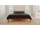 Bedroom features a hardwood bed frame and neutral carpeting at 14616 Pomerol Ln, Pineville, NC 28134