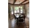 Dining area with tile floor, classic wooden table and chairs, and natural light at 1619 Bellamy Cir, Albemarle, NC 28001