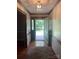Inviting entryway with hardwood floors, a decorative rug, and natural light at 1619 Bellamy Cir, Albemarle, NC 28001