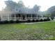 Charming brick home featuring a spacious front porch, dormer windows, and well-manicured lawn at 1619 Bellamy Cir, Albemarle, NC 28001