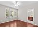 Comfortable bedroom boasts beautiful hardwood floors and bright natural light at 18339 The Commons Blvd, Cornelius, NC 28031
