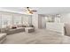 Spacious living room with lots of natural light and comfortable sectional sofa at 18339 The Commons Blvd, Cornelius, NC 28031
